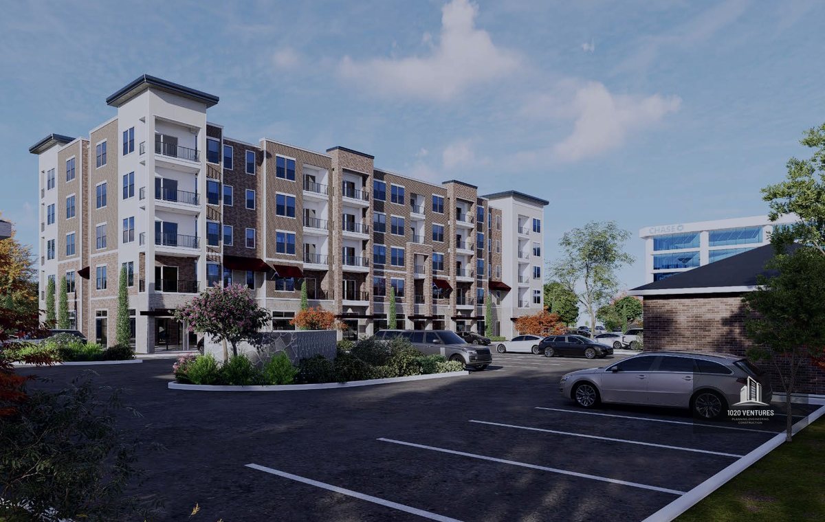 Courtyard and parking view rendering of the mixed-use planned development, Arlington, Texas